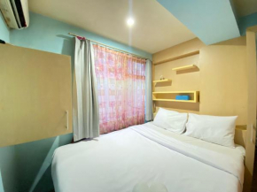 Homey Living 2BR at Jarrdin Cihampelas Apartment By Travelio